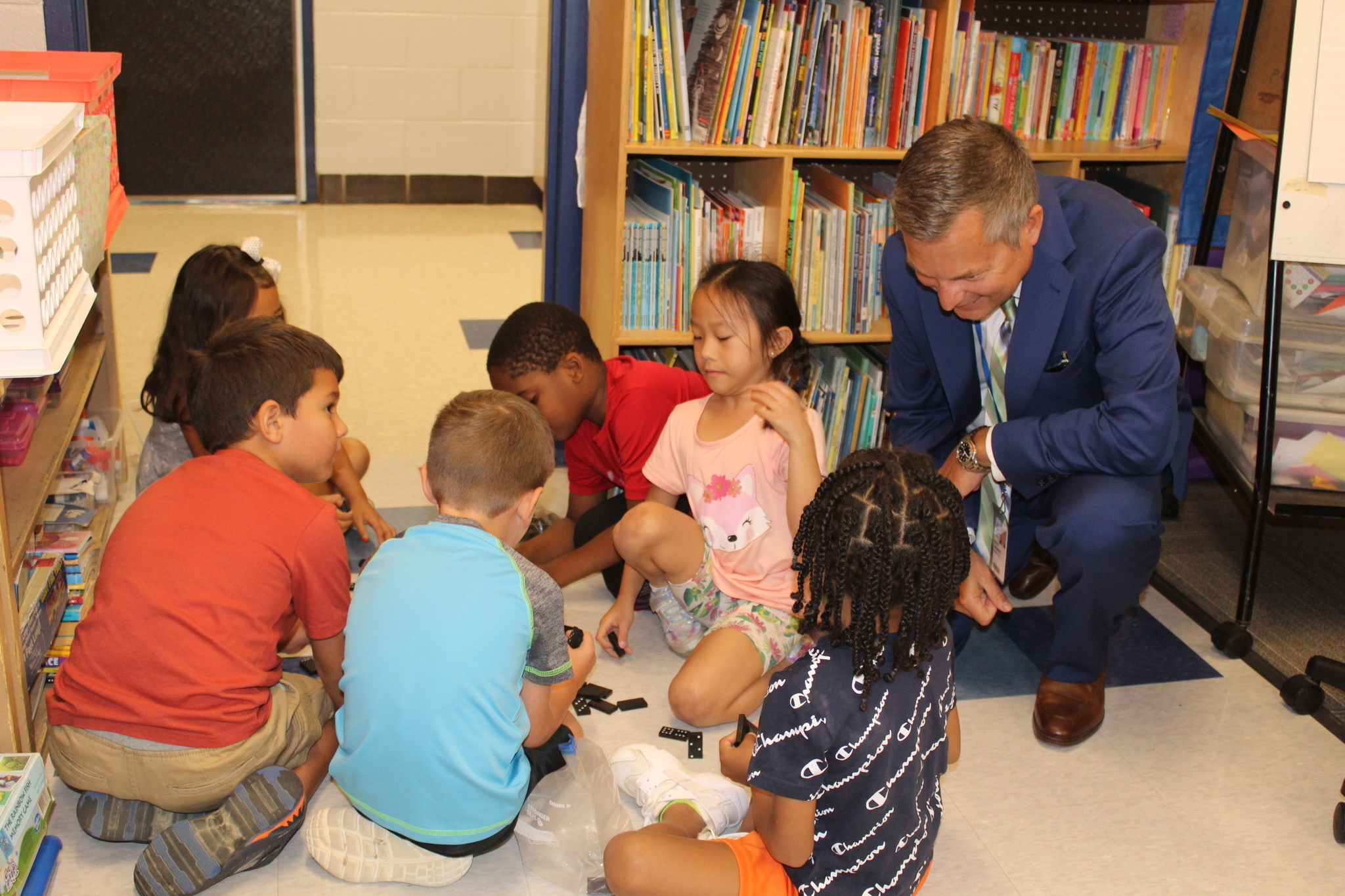 Superintendent with Students, Reading